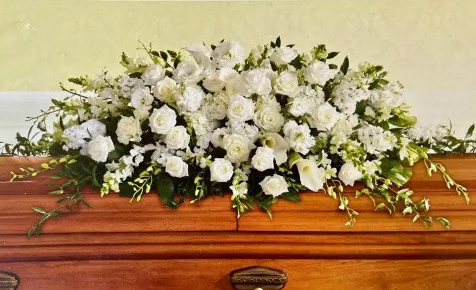 Peaceful White Casket Spray Branching Out Florists