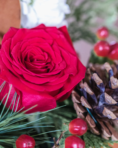 red rose, green hydrangea, white stock, cones, berries, pine, cedar, eucalyptus, holiday arrangement, tree ornament