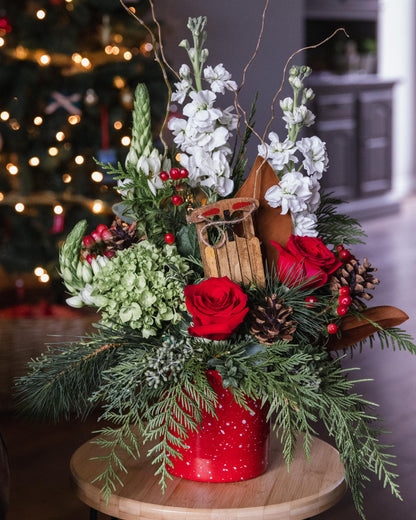 red rose, green hydrangea, white stock, cones, berries, pine, cedar, eucalyptus, holiday arrangement, tree ornament